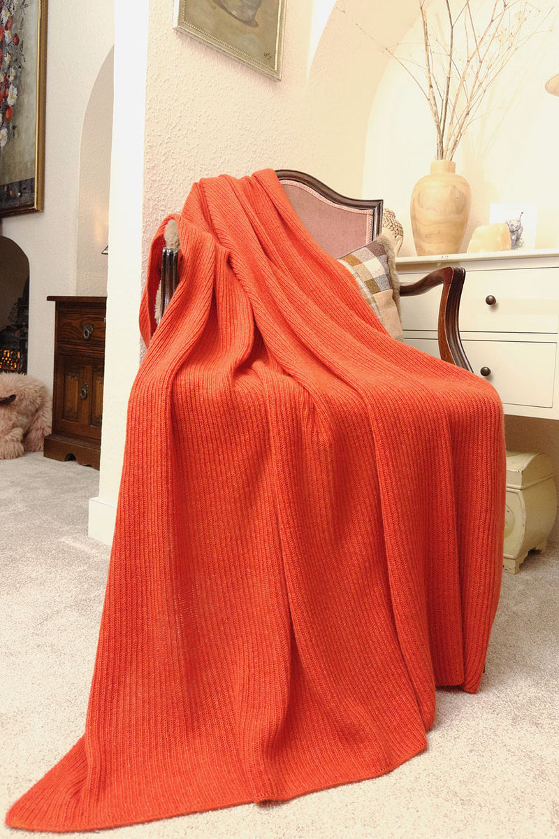 Cashmere blanket in burnt orange