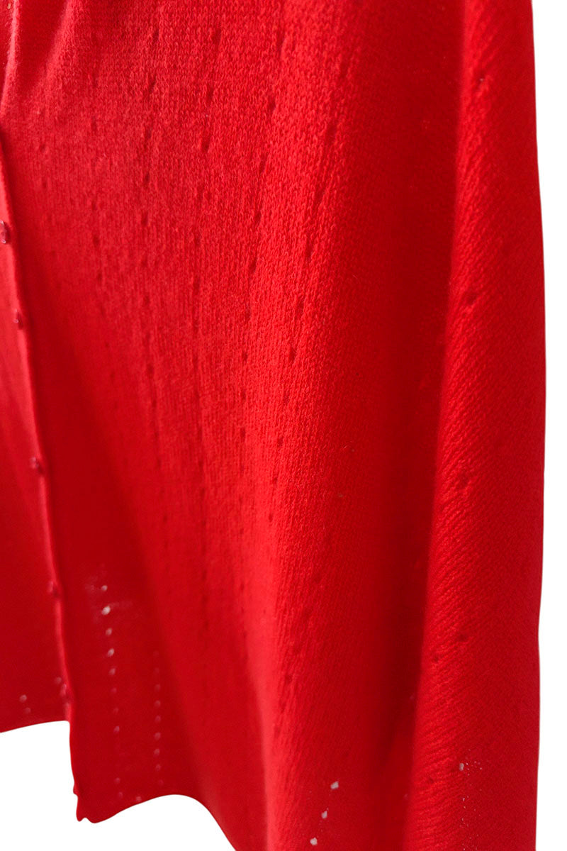 Bright red cashmere poncho close up
