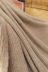 Cashmere blanket in dark beige close-up