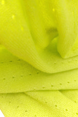 Neon yellow green cashmere poncho close-up
