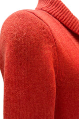 Chunky cashmere cardigan in burnt orange close up