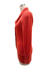 Chunky cashmere cardigan in burnt orange side view