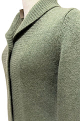 Chunky cashmere cardigan in olive green close-up